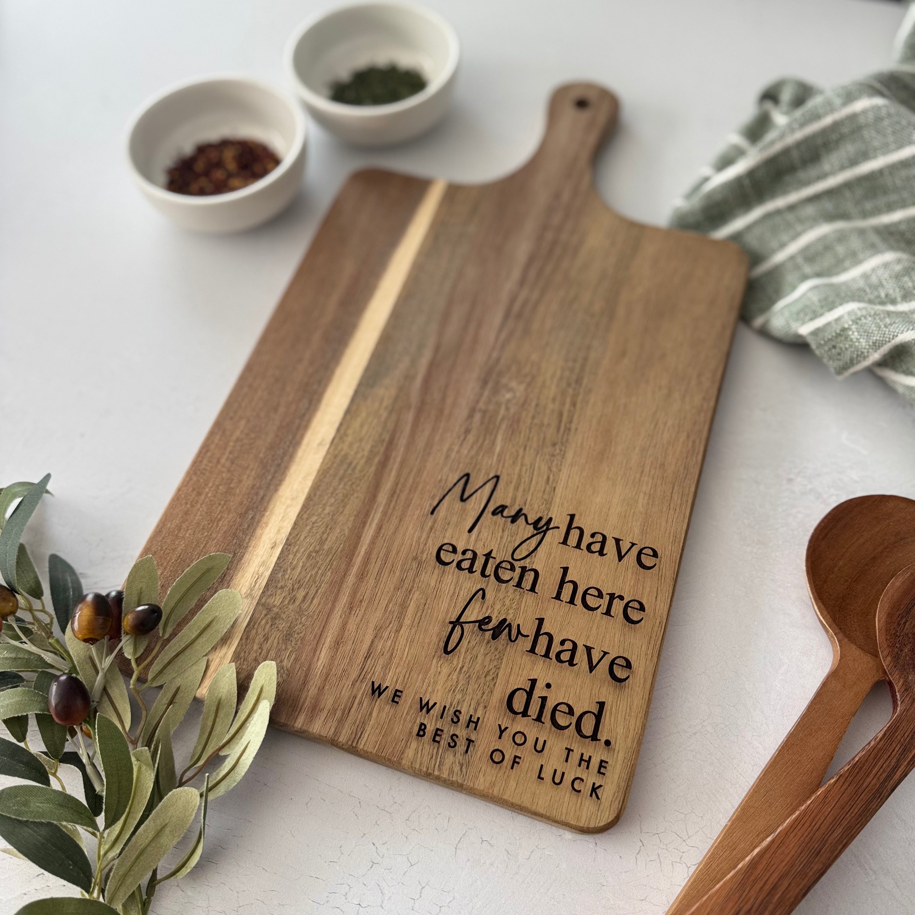 Many Have Eaten Here Few Have Died Engraved Acacia Cutting Board
